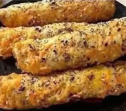 Thumbnail for The Ultimate Cheesy Sausage Puff Pastry Rolls