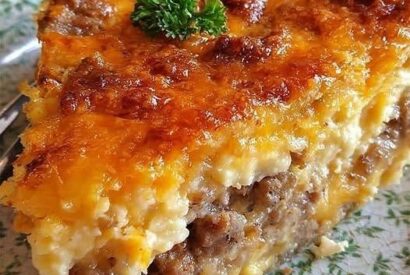 Thumbnail for Cheesy Monterey Sausage Pie A Warm, Savory, and Comforting Breakfast or Dinner Pie Loaded with Ground Sausage and Monterey Jack Cheese