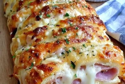 Thumbnail for Sunday-Table Comfort Italian Stromboli A Golden, Flaky, and Meat-Packed Italian Classic Stuffed with Cured Meats and Melted Cheese