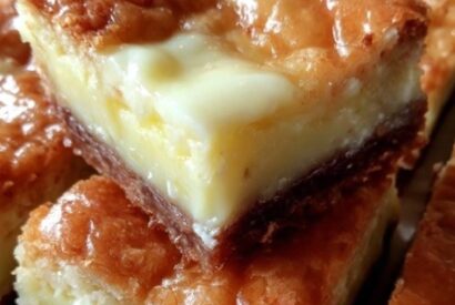 Thumbnail for Ooey Gooey Bars: The Buttery Cake Mix Bars with a Creamy, Melt-in-Your-Mouth Filling